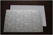 log embossed foil wrapped cake base